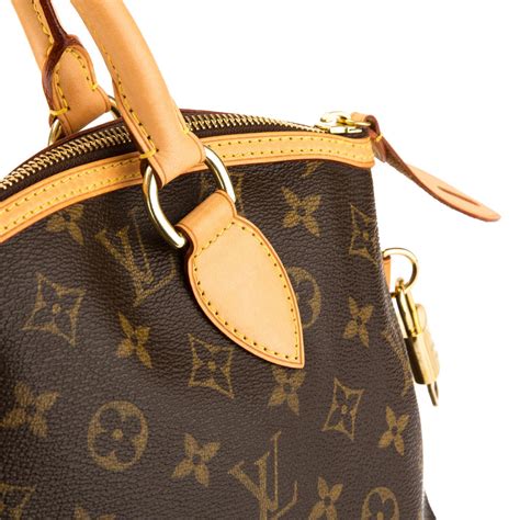 louis vuitton lockit bag history